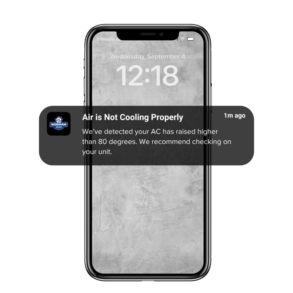 Smartphone screen showing a notification from a home monitoring service stating, "Air is Not Cooling Properly," advising the user to check their AC unit. Time displayed is 12:18.