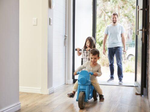 Family Entering Home after Indoor Air Quality Service in Norman, OK